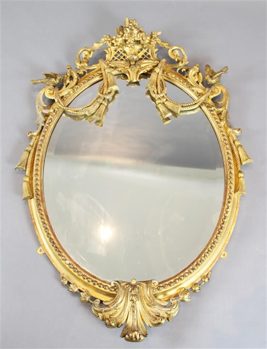 A Victorian giltwood and gesso wall mirror, W.2ft 8in. H.3ft 10in.
